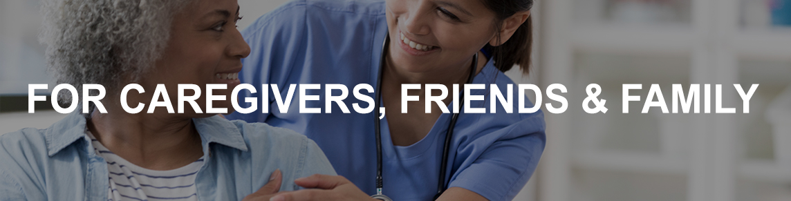 Woman & nurse smiling at each other, while embracing