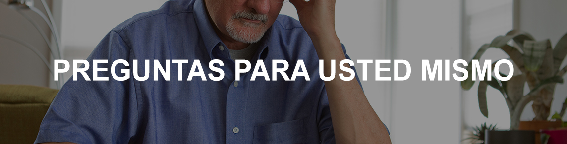 Man sitting down reading directions for pill bottles