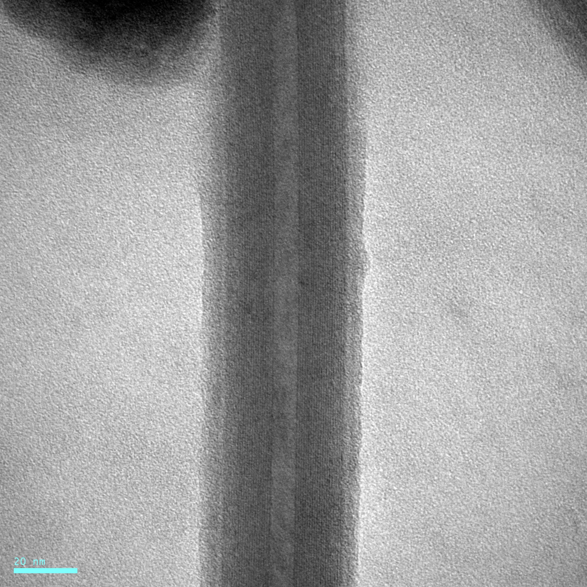 high-resolution TEM image of concentric crystal sheets in Chrysotile asbestos from water sample