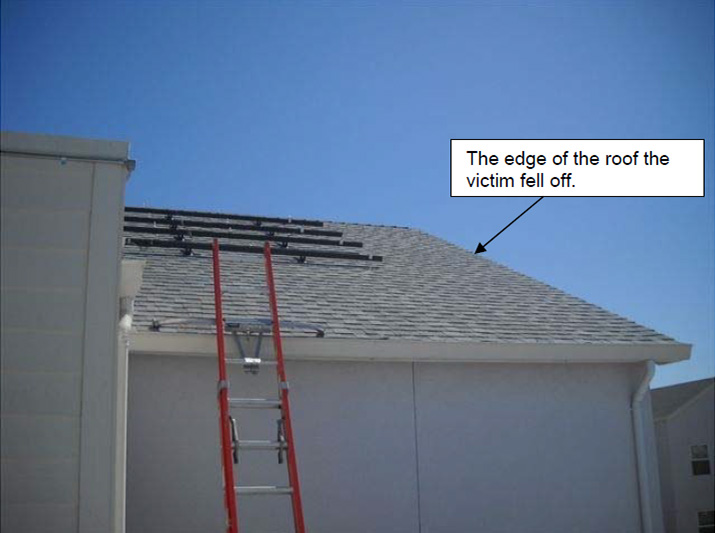 A red ladder rests against the sloped roof of a light-colored residential building. A text box with an arrow pointing to the edge on the right side says, the edge of the roof the victim fell off.
