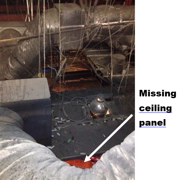The area where the victim fell, near air conditioning ducts where a ceiling panel is now missing.