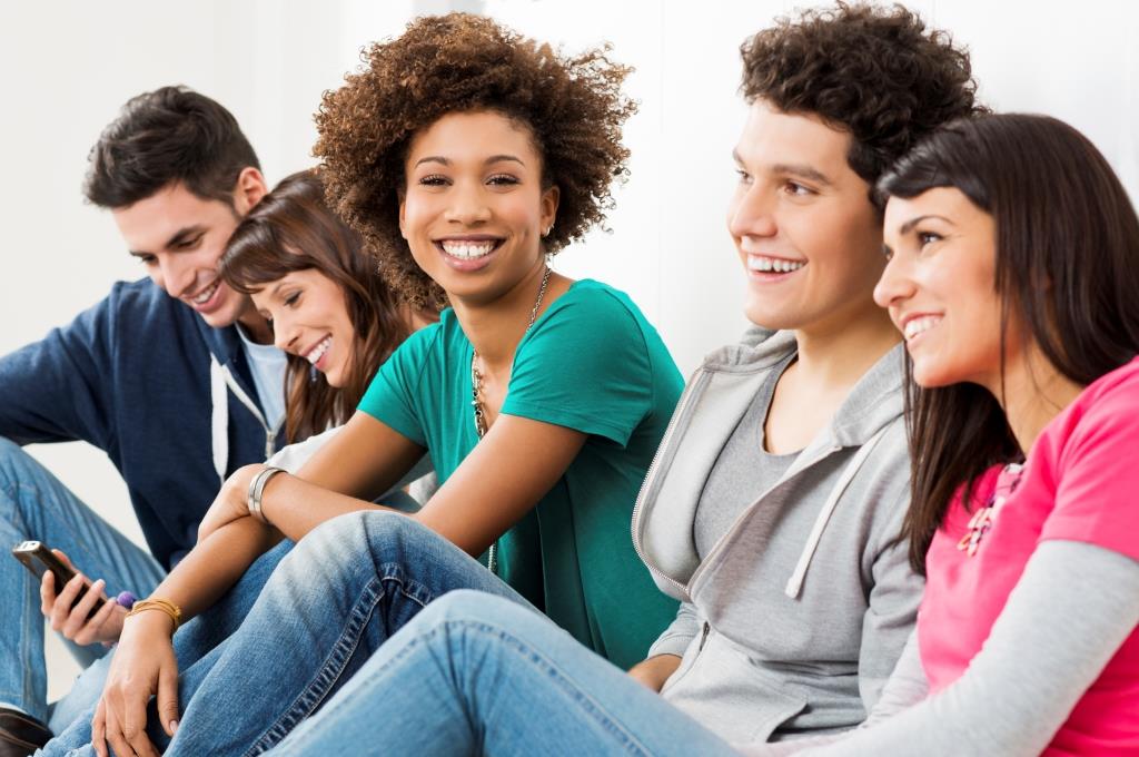 Group of teenager ages 17-19 sitting down together