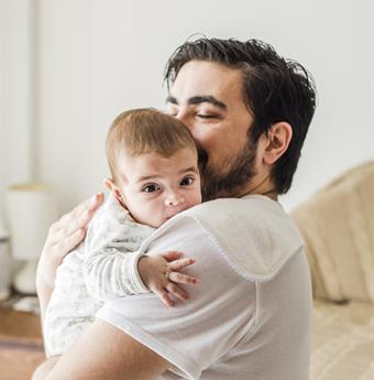 Man holding baby