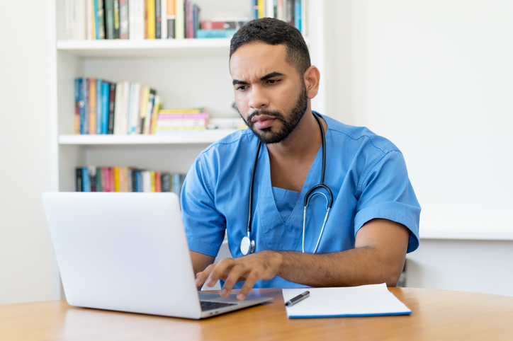 Physician at computer