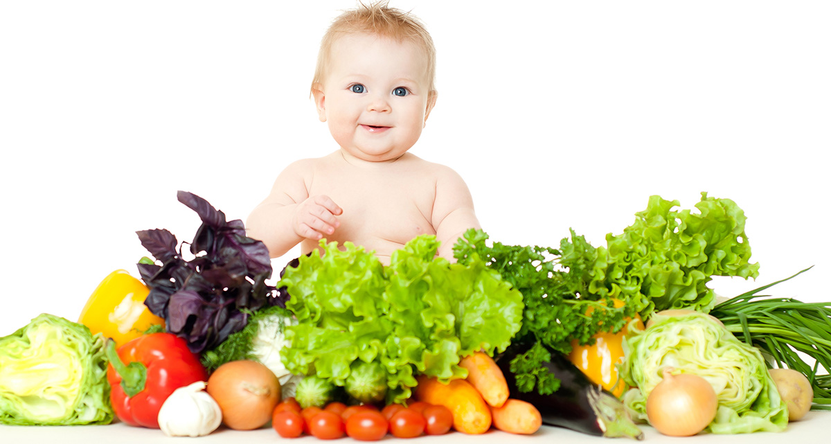 Baby with vegetables