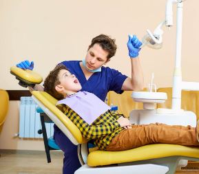 child and dentist.JPG child in dentist chair